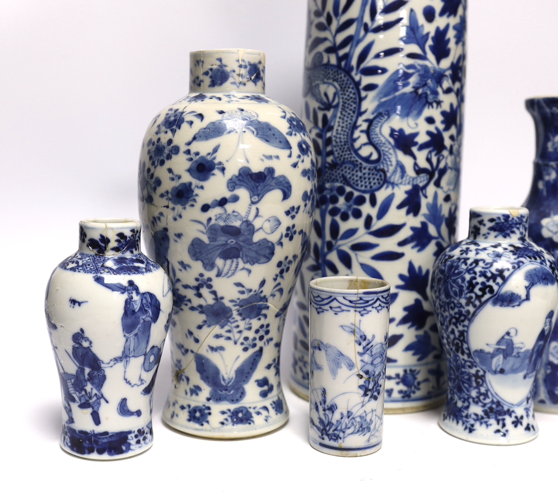 Seven assorted late 19th century Chinese blue and white vases (a.f.), tallest 35.5cm
